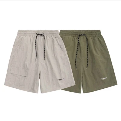 Calções cargo masculinos quentes de verão Sólidos com vários bolsos Calças de trabalho soltas de fitness de verão Masculinas Shorts de corrida